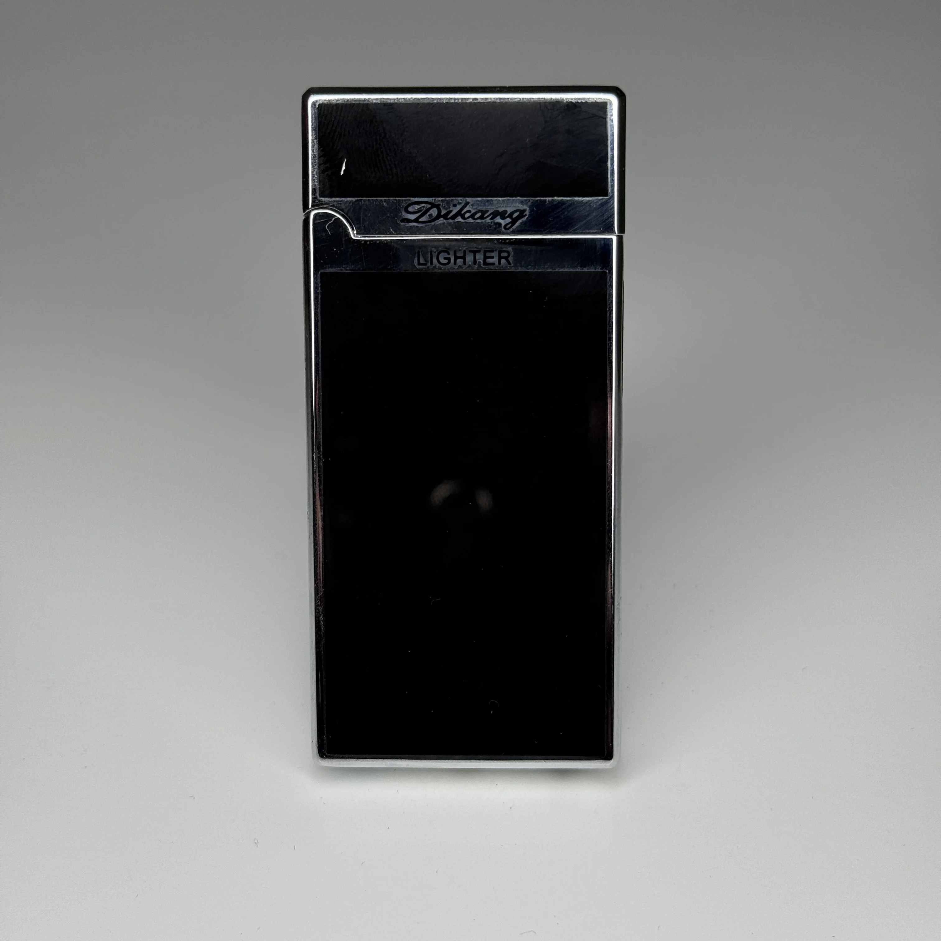 Bricheta Argintiu/negru DIKANG cu sunet si aprindere pe Touch SNT01