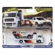 HOT WHEELS TRANSPORTATOR FLEET STREET CU MASINUTA TOYOTA OFF ROAD TRUCK SCARA 1: 64